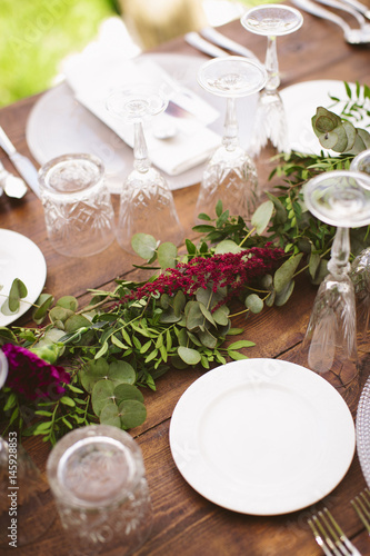 Luxury table for a wedding decorated with flowers