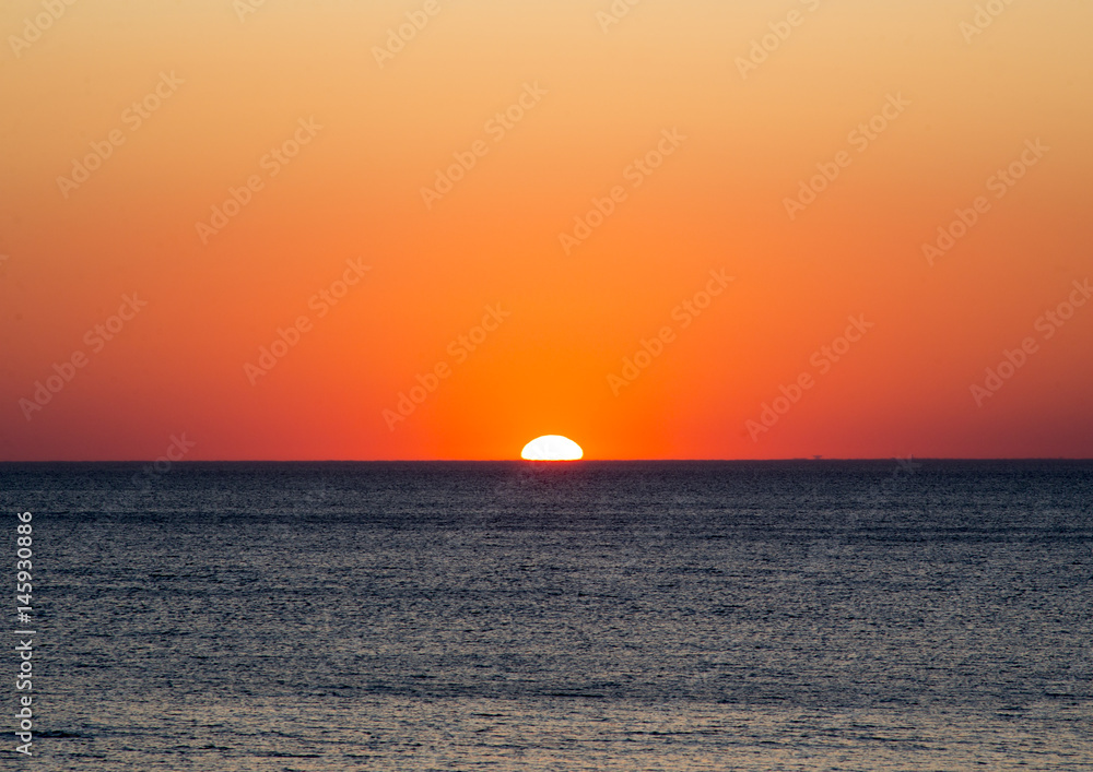 Scenary seascape with colorful sunset