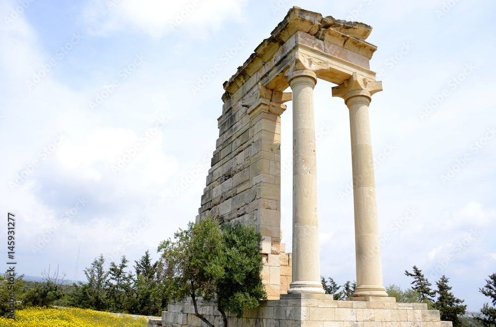 Architecture from the sanctuary of Apollon Hylates and cloudy blue sky