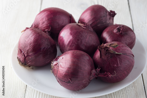 Red Onion on a white plate