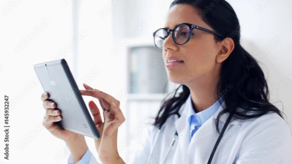 female doctor with tablet pc at hospital female doctor with tablet pc at hospital