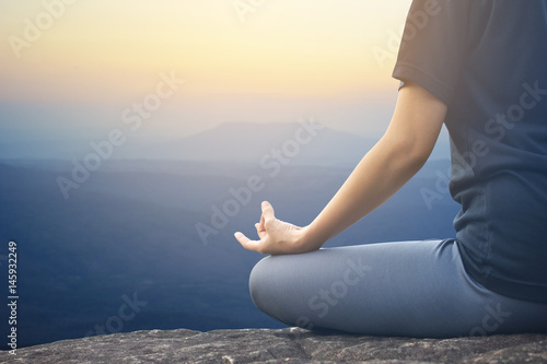Women yoga in nature background, color of vintage tone