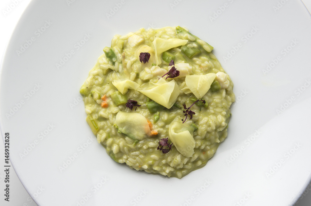 Risotto dish with asparagus scallops and ginger Risotto dish with asparagus scallops and ginger
