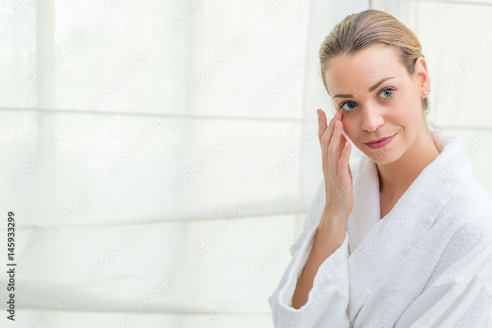 woman taking care of her skin