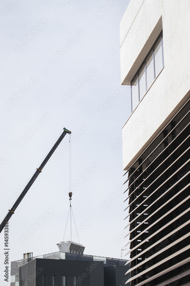 Installation industrial air conditioner with a crane Installation industrial air conditioner with a crane