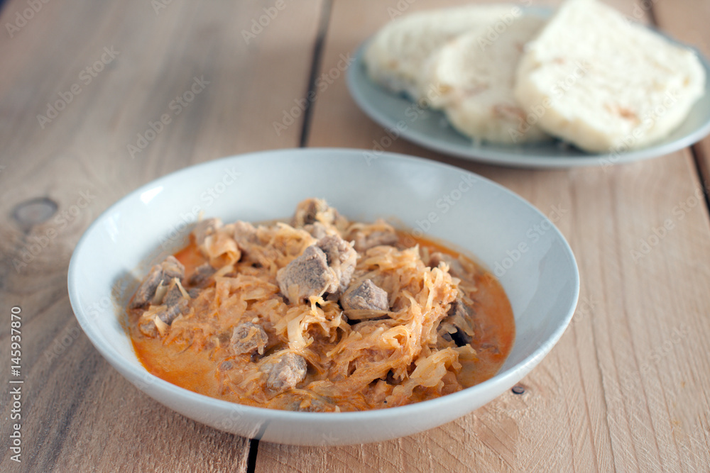 szeged gulyasz (segedin in czech) - pork goulash with pickled white cabbage (sauerkraut) and dumplings szeged gulyasz (segedin in czech) - pork goulash with pickled white cabbage (sauerkraut) and dumplings