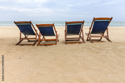 Fototapeta Naklejka Na Ścianę i Meble -  beach chairs on the sandy beaches