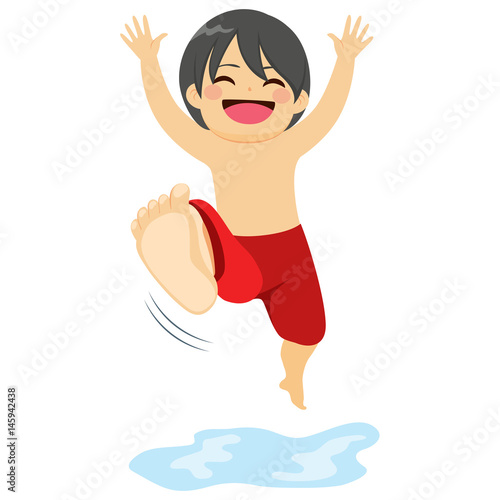 Little happy boy in swimwear jumping into water
