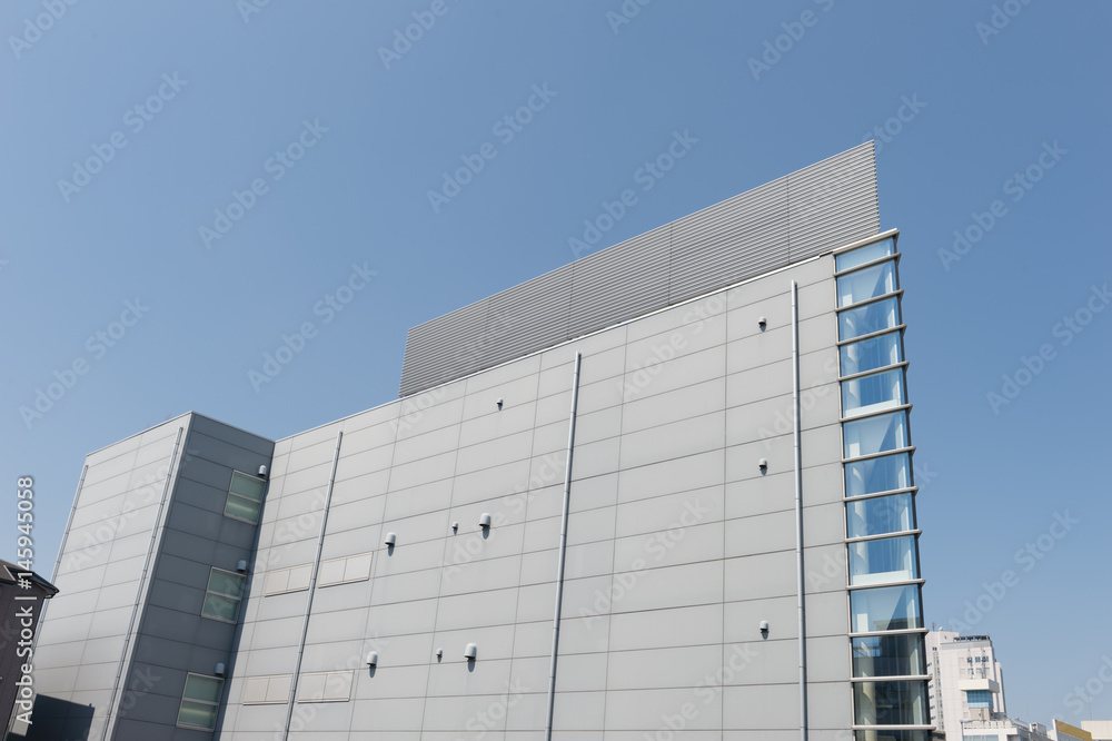 Office building in the city under blue sky Office building in the city under blue sky