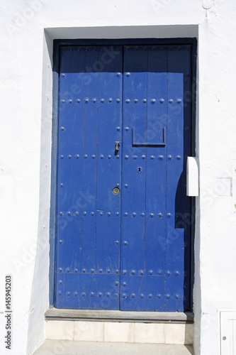 old blue wooden door © chrupka