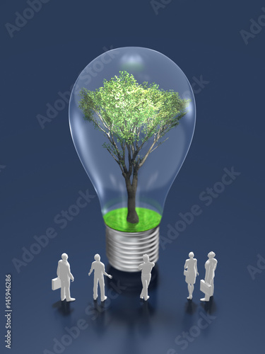 Business figures looking at the light bulb with trees