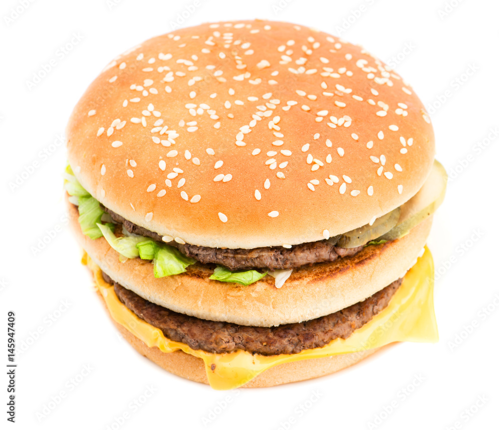 Fast food hamburger close-up isolated on white Fast food hamburger close-up isolated on white