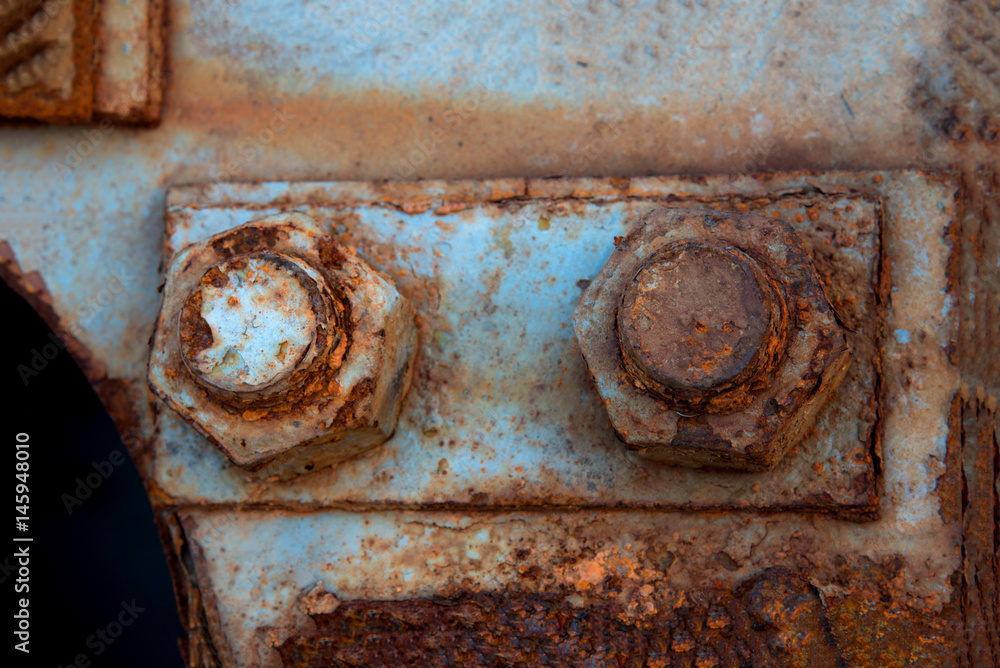 Old steel nut and rusty fixed steel pole
Old steel nut and rusty fixed steel pole