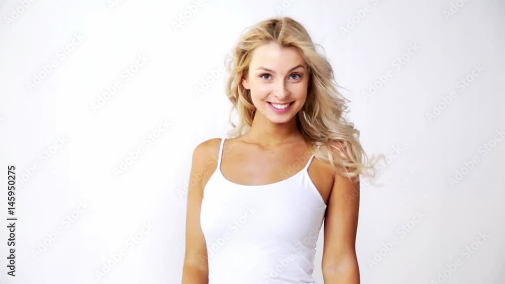 happy smiling beautiful young woman in white top happy smiling beautiful young woman in white top