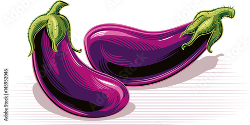 ripe aubergine, resting on a table.