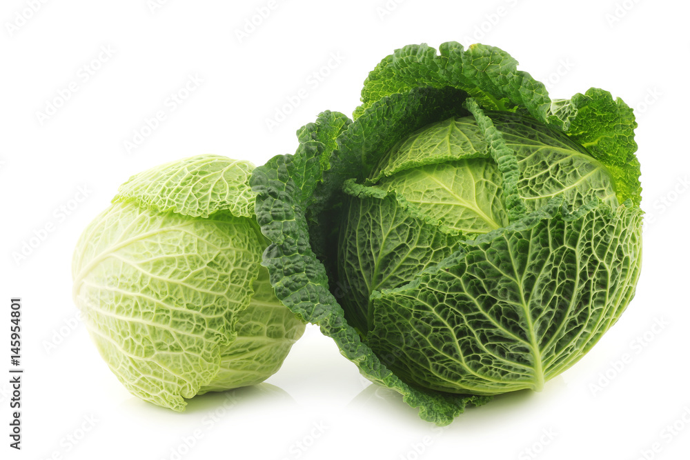 Fototapeta premium two green cabbages on a white background