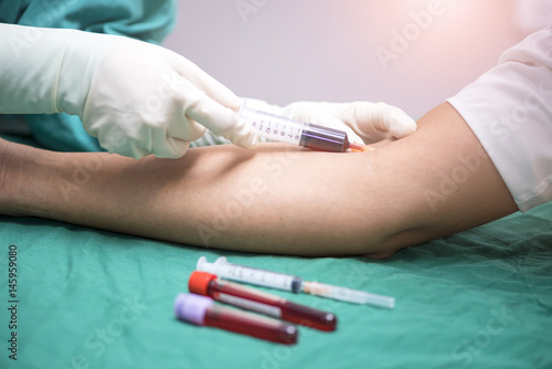 Wallpaper Mural Nurse collecting a blood from a patient Torontodigital.ca