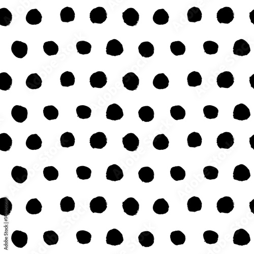 Abstract black and white retro seamless background. Hand drawn black ink polka dot pattern. Vector illustration.