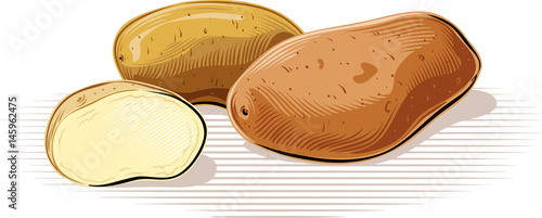 Potatoes resting on a plane.