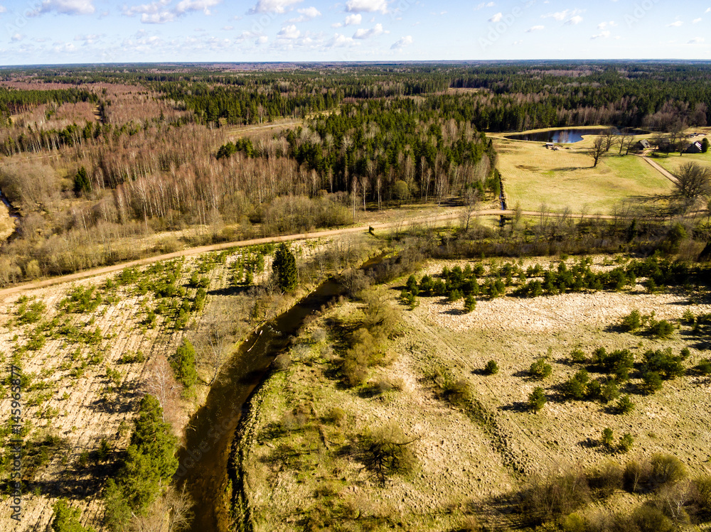 drone image. aerial view of rural area with river in forests