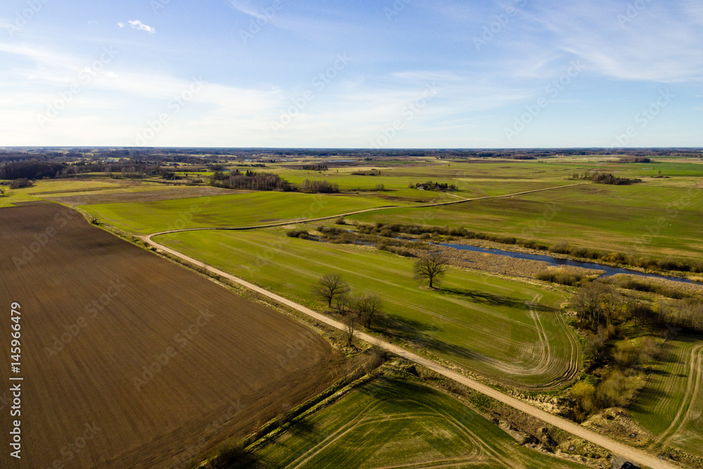 drone image. aerial view of rural area with freshly cultivated fields