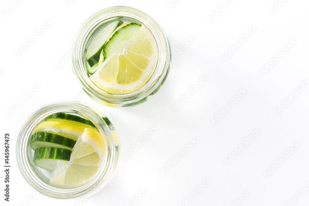 Detox water with cucumber and lemon isolated on white background
Detox water with cucumber and lemon isolated on white background