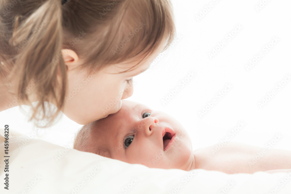 elder sister with the newborn child