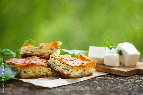 Spinach and feta pie in filo pastry, pita zeljanica, traditional Greek spanakopita.