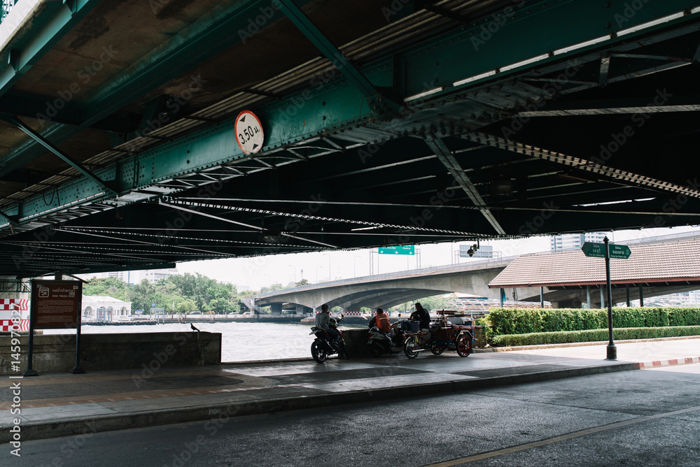People Gathered Under the Bridge in Bangkok, Thailand People Gathered Under the Bridge in Bangkok, Thailand