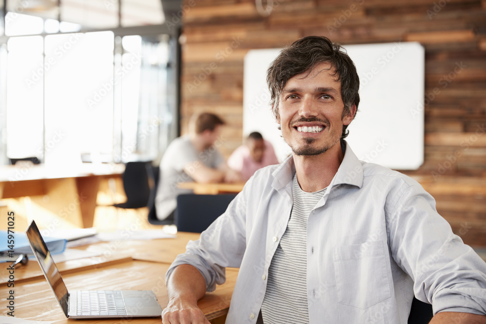 Casually dressed mid adult white man in office, portrait Casually dressed mid adult white man in office, portrait