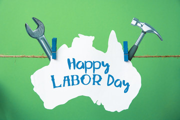 happy Labor day Australia card. 1 May Workers Day Australian  flag, Hammer and wrench - grunge abstract image  