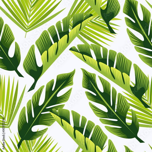 Seamless tropical ornament. green leaves.