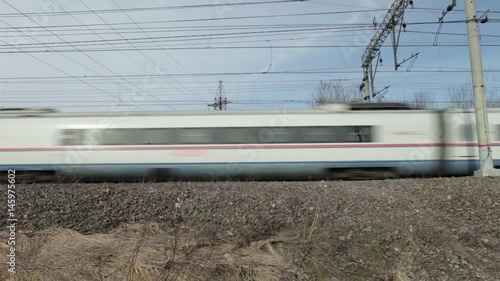 April 12, 2017 St. Petersburg, Russian Railways high-speed passenger train Sapsan from St. Petersburg to Moscow in motion, low angle view  photo