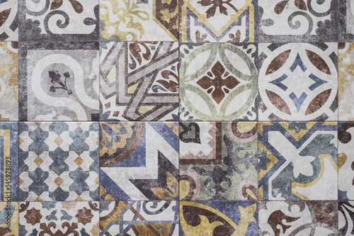 Colorful Moroccan tiles, ornaments, mosaic floor texture © Iuliia