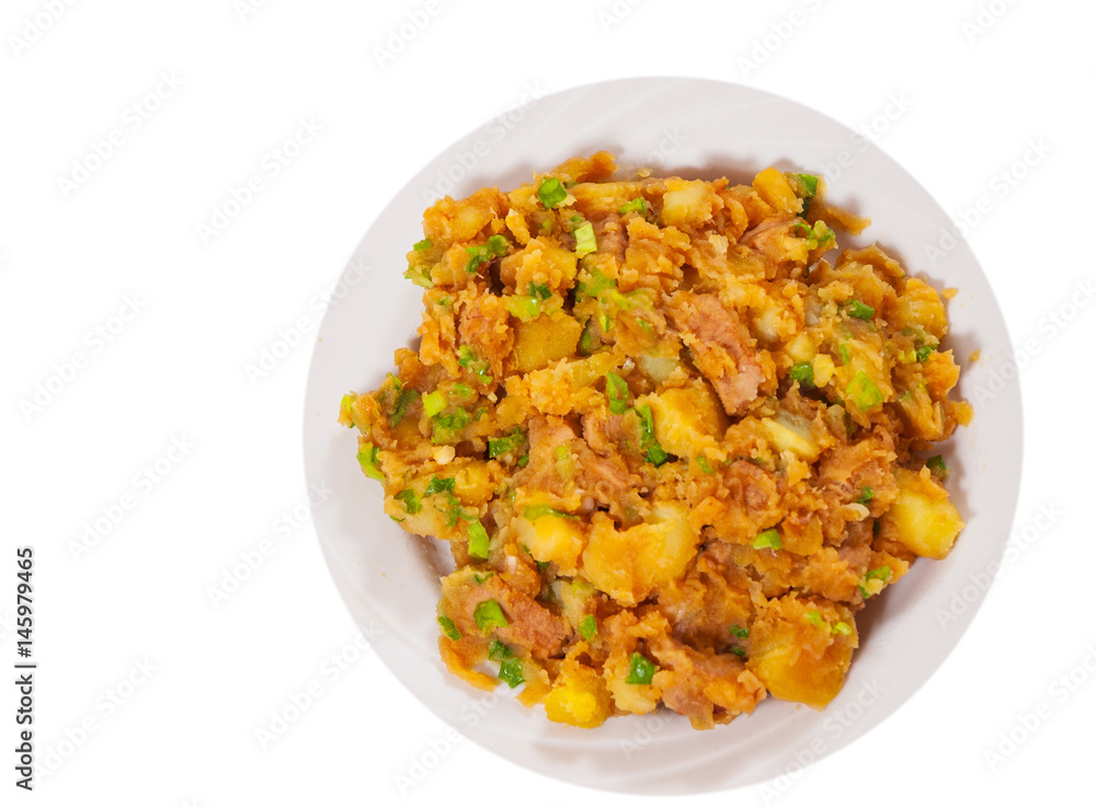 stewed meat with potatoes, onion on plate. top view. isolated on white stewed meat with potatoes, onion on plate. top view. isolated on white