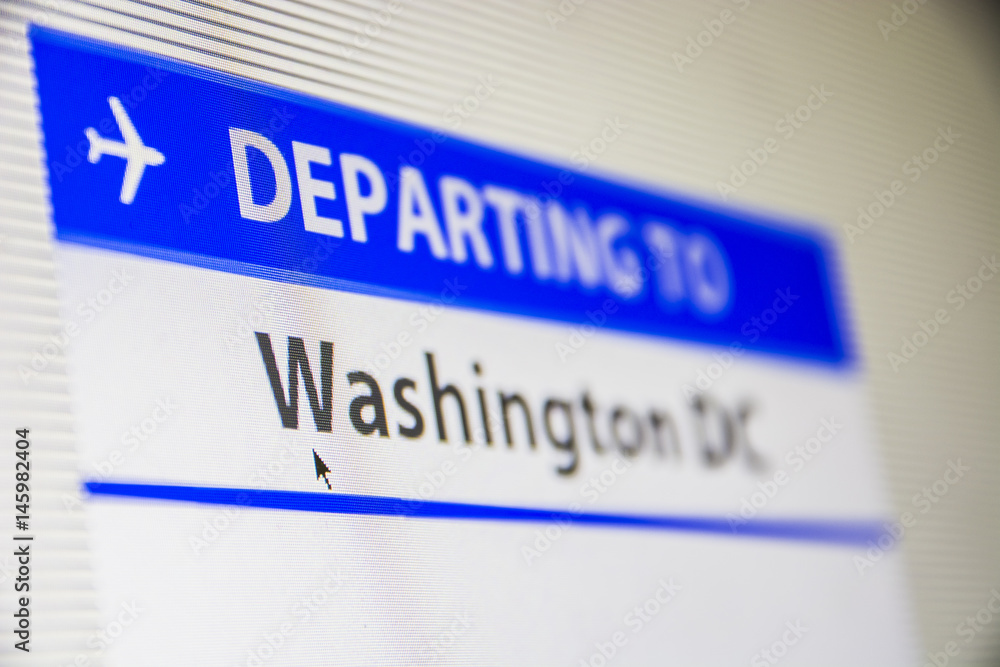 Computer screen close-up of status of flight departing to Washington, DC, USA Computer screen close-up of status of flight departing to Washington, DC, USA