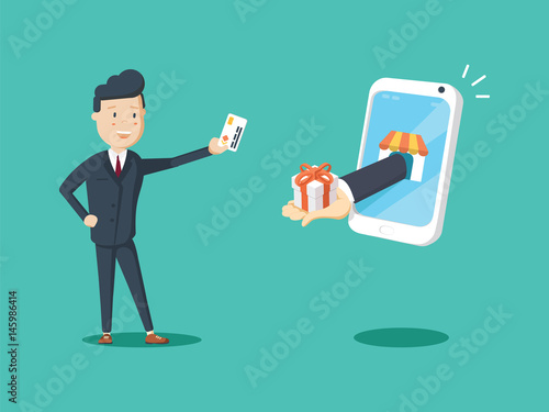 Happy businessman use credit card to shopping online and receive a gift box from smart phone.