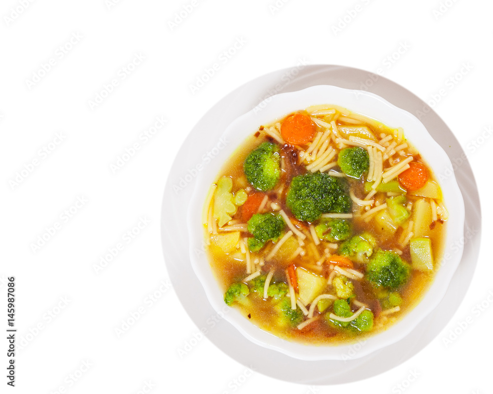 Fresh vegetable soup with noodles. top view. isolated on white