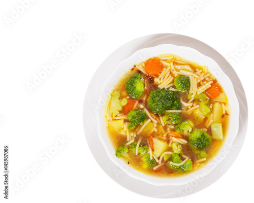 Fresh vegetable soup with noodles. top view. isolated on white