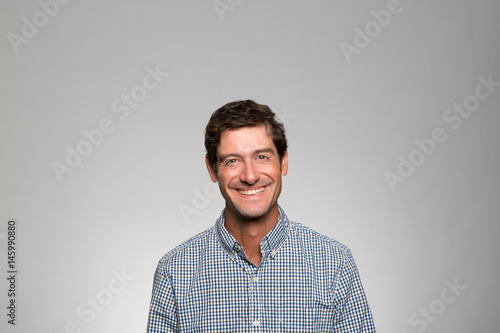 Studio portrait of an excited businessman