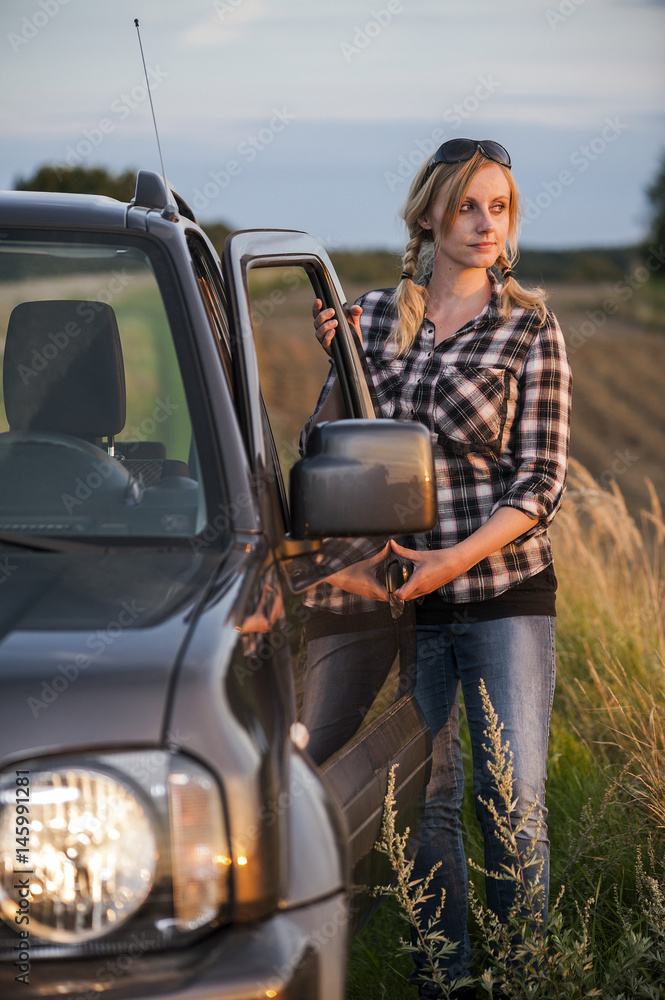 Naklejka premium Young woman enjoying off road trip