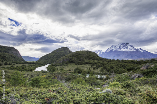 Torres del Paine National Park in Chile Patagonia region, as seen alongside river and cordillera in background