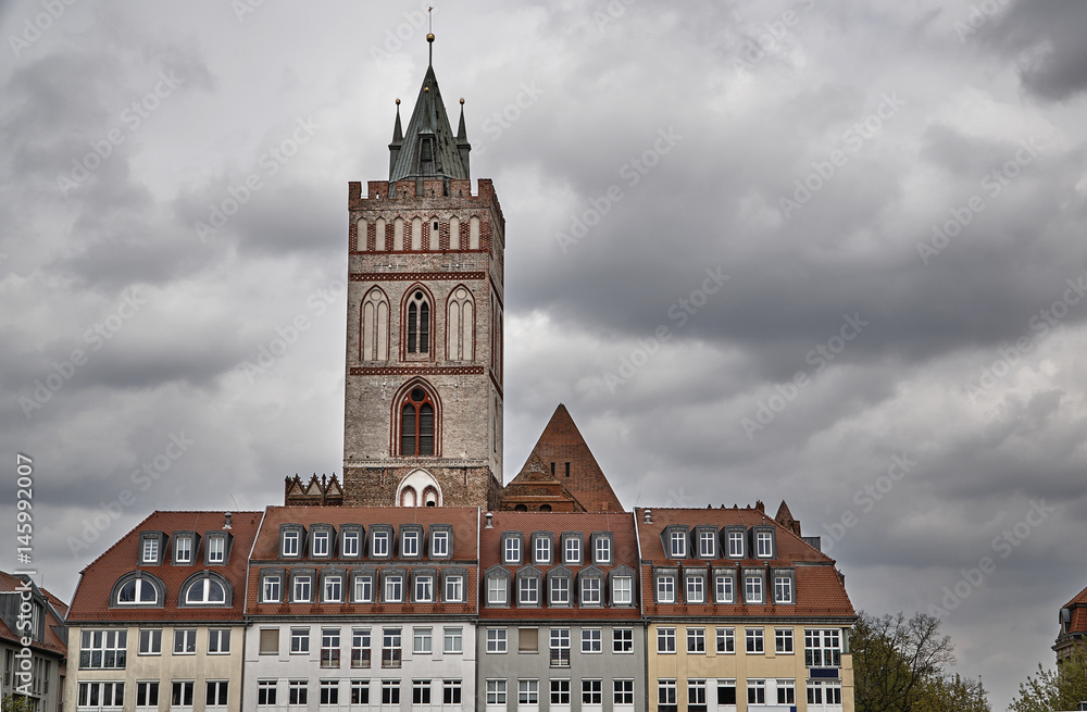 Old town townhouses and Gothic church tower in Frankfurt on the Oder.
