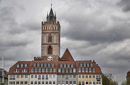 Old town townhouses and Gothic church tower in Frankfurt on the Oder.