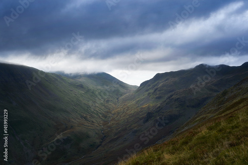 Views up Grisedale Beck towards the Summits of Fairfield and Dollywagon in the Lake District, England, UK.