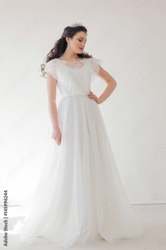 Princess with a Crown in white dress the bride Princess with a Crown in white dress the bride