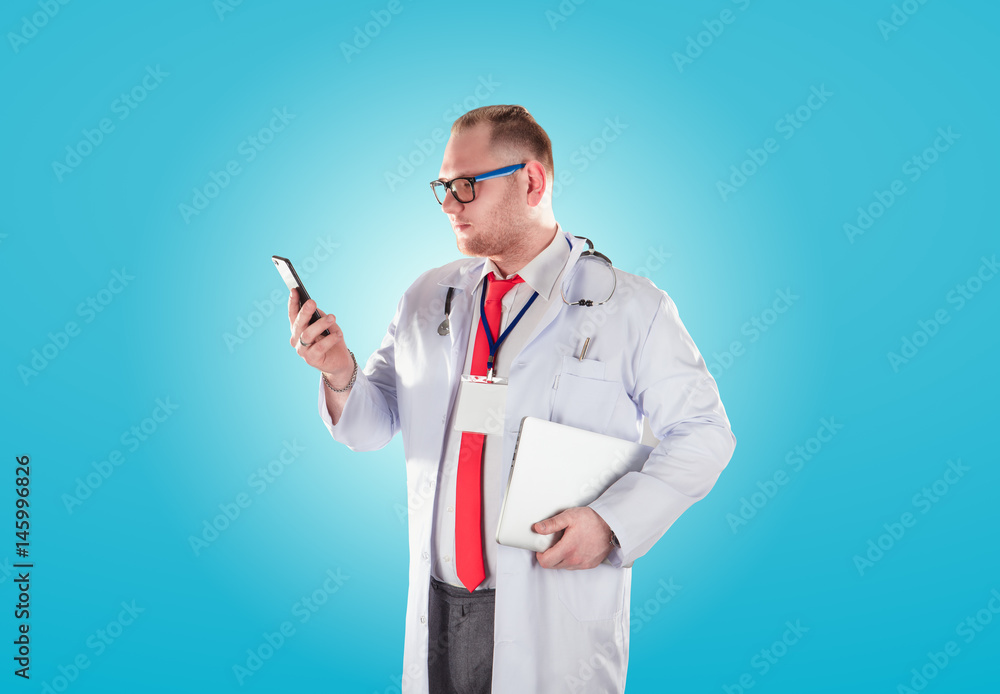 Portrait of young handsome happy male doctor. Portrait of young handsome happy male doctor.