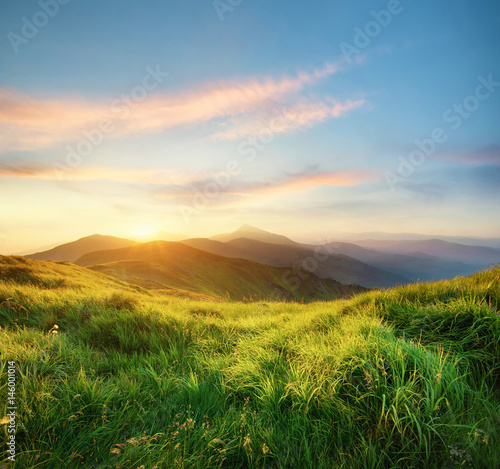Mountain landscape during sunrise. Natural landscape in the summer time