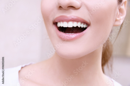 Smiling young woman, closeup