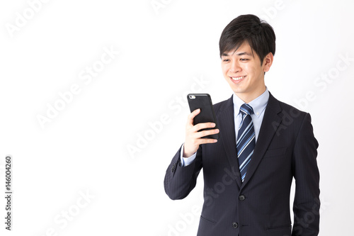 portrait of asian businessman isolated on white background